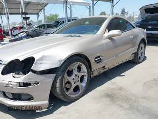 2005 Mercedes-Benz SL 500 z VIN WDBSK75F75F090730, wystawiony jako IAAI lot #42278730 z przebiegiem 83 765 mil mil oraz . Historia ofert i sprzedaży dostępna na DreamBid. Obrazek 6.
