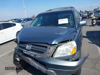 2005 Honda Pilot EX-L with VIN 2HKYF18565H534394, listed as a IAAI auction lot 41539630 with 168,384 mi miles. Bid and sale history available at carsss.com. Image 12.