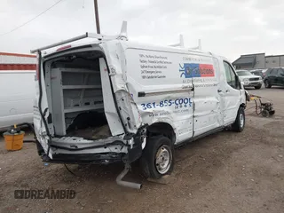 2023 Ford Transit Cargo with VIN 1FTYE1Y82PKB92413, listed as a IAAI auction lot 41702808 with 20,144 mi miles and . Bid and sale history available at DreamBid. Image 4.