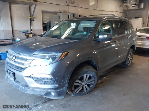 2016 Honda Pilot EX-L with VIN 5FNYF6H55GB103141, listed as a IAAI auction lot 41535841 with 129,231 mi miles. Bid and sale history available at carsss.com. Image 17.