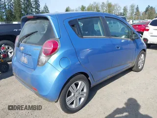 2015 Chevrolet Spark LS with VIN KL8CB6S94FC751401, listed as a IAAI auction lot 42032919 with 61,149 mi miles and . Bid and sale history available at DreamBid. Image 4.