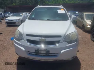 2014 Chevrolet Captiva Sport LTZ z VIN 3GNAL4EK8ES636461, wystawiony jako IAAI lot #42290343 z przebiegiem 167 816 mil mil oraz . Historia ofert i sprzedaży dostępna na DreamBid. Obrazek 6.