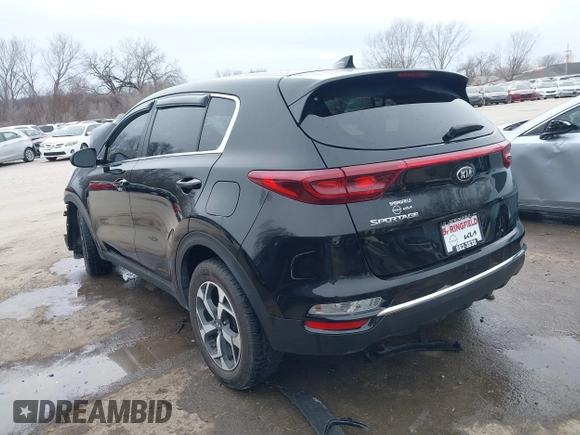 2021 Kia Sportage LX with VIN KNDPM3AC6M7858714, listed as a IAAI auction lot 41542186 with 140,617 mi miles. Bid and sale history available at carsss.com. Image 3.