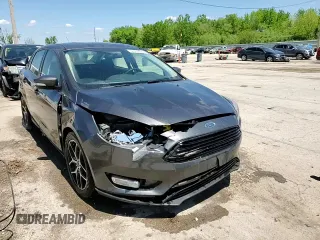 2018 Ford Focus SE z VIN 1FADP3F20JL257320, wystawiony jako Copart lot #55956435 z przebiegiem 26 919 mil mil oraz Szkoda całkowita • Salvage title. Historia ofert i sprzedaży dostępna na DreamBid. Obrazek 13.