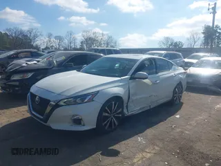 2019 Nissan Altima 2.5 Platinum with VIN 1N4BL4FV9KC116654, listed as a IAAI auction lot 41505682 with 154,065 mi miles. Bid and sale history available at carsss.com. Image 2.