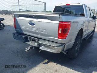 2021 Ford F-150 XL with VIN 1FTFW1E52MFC44822, listed as a IAAI auction lot 41657464 with 83,994 mi miles. Bid and sale history available at carsss.com. Image 6.