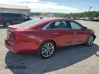 2014 Cadillac XTS Luxury z VIN 2G61M5S31E9154939, wystawiony jako Copart lot #57634995 z przebiegiem 89 120 mil mil oraz Szkoda całkowita • Salvage title. Historia ofert i sprzedaży dostępna na DreamBid. Obrazek 3.