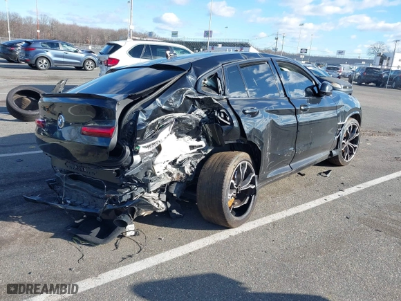 2020 BMW X4 M Competition with VIN 5YMUJ0C08LLA99688, listed as a IAAI auction lot 41226234 with 63,497 mi miles. Bid and sale history available at carsss.com. Image 4.