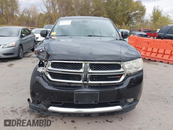 2013 Dodge Durango Crew with VIN 1C4RDHDG8DC592706, listed as a IAAI auction lot 40745114 with 95,757 mi miles and . Bid and sale history available at DreamBid. Image 12.