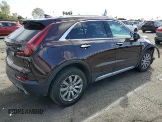 2020 Cadillac XT4 FWD Premium Luxury with VIN 1GYFZCR46LF112188, listed as a Copart auction lot 51536115 with 31,427 mi miles and Salvage title. Bid and sale history available at DreamBid. Image 3.