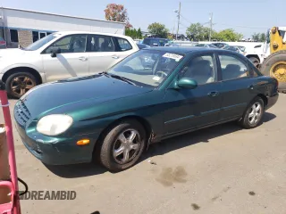 1999 Hyundai Sonata GLS with VIN KMHWF35V9XA100869, listed as a Copart auction lot 68219694 with 144,388 mi miles and Non Repairable. Bid and sale history available at carsss.com. Image 1.