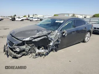 2016 Mazda Mazda6 i Touring with VIN JM1GJ1V57G1462307, listed as a Copart auction lot 73496934 with 0 mi miles and Salvage Title. Bid and sale history available at carsss.com. Image 1.