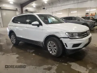 2018 Volkswagen Tiguan S with VIN 3VV1B7AX4JM118670, listed as a Copart auction lot 57055935 with 104,443 mi miles and Salvage title. Bid and sale history available at DreamBid. Image 4.