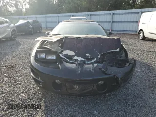 1999 Pontiac Firebird Trans Am with VIN 2G2FV32G1X2217352, listed as a Copart auction lot 79941714 with 174,580 mi miles and Salvage title. Bid and sale history available at DreamBid. Image 5.