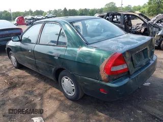 1998 Mitsubishi Mirage DE z VIN JA3AY26A2WU001675, wystawiony jako IAAI lot #42484995 z przebiegiem 89 680 mil mil oraz . Historia ofert i sprzedaży dostępna na DreamBid. Obrazek 3.