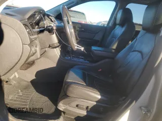 2016 Chevrolet Traverse LTZ with VIN 1GNKVJKD3GJ228201, listed as a Copart auction lot 86395134 with 148,436 mi miles and Salvage Title. Bid and sale history available at DreamBid. Image 7.