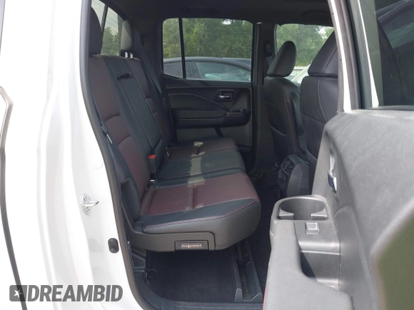 2023 Honda Ridgeline Black Edition with VIN 5FPYK3F84PB011792, listed as a IAAI auction lot 42049593 with 21,002 mi miles and . Bid and sale history available at DreamBid. Image 8.