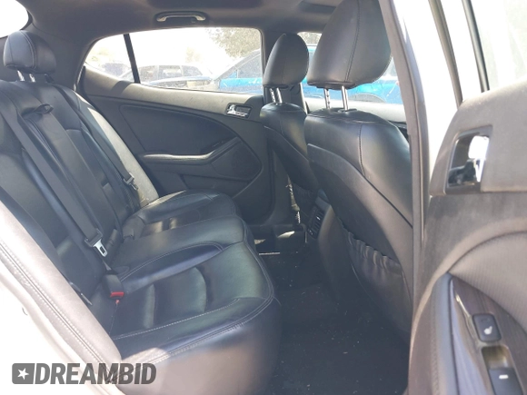 2013 Kia Optima SX with VIN 5XXGR4A64DG239506, listed as a IAAI auction lot 42406234 with 158,626 mi miles and . Bid and sale history available at DreamBid. Image 8.
