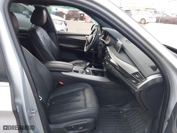 2018 BMW X5 xDrive40e iPerformance with VIN 5UXKT0C59J0W01768, listed as a IAAI auction lot 41603257 with 1 mi miles. Bid and sale history available at carsss.com. Image 5.