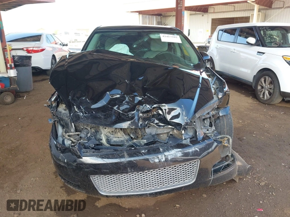 2014 Chevrolet Impala LT with VIN 2G1WB5E34E1158088, listed as a IAAI auction lot 42417592 with 92,995 mi miles and . Bid and sale history available at DreamBid. Image 13.