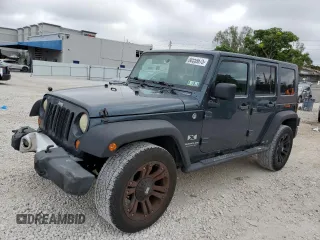 2007 Jeep Wrangler Unlimited X with VIN 1J8GA39107L105101, listed as a Copart auction lot 88559675 with 213,902 mi miles and Salvage title. Bid and sale history available at DreamBid. Image 1.
