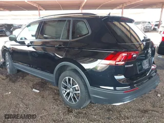 2021 Volkswagen Tiguan S with VIN 3VV1B7AX2MM055220, listed as a IAAI auction lot 41970381 with 30,433 mi miles. Bid and sale history available at carsss.com. Image 3.