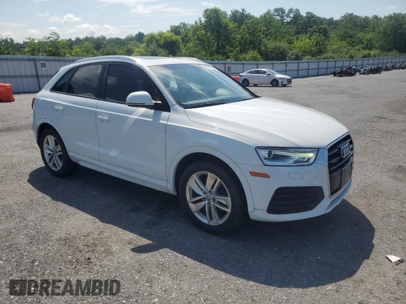 2018 Audi Q3 Premium with VIN WA1ECCFS8JR024576, listed as a Copart auction lot 64018985 with 128,784 mi miles and Clean title. Bid and sale history available at DreamBid. Image 4.