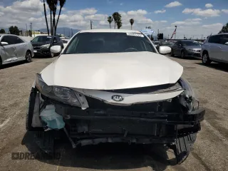 2015 Kia Optima LX with VIN KNAGM4A70F5605196, listed as a Copart auction lot 56984125 with 150,500 mi miles and Clean Title. Bid and sale history available at DreamBid. Image 5.
