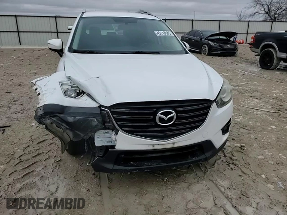 2016 Mazda CX-5 Touring with VIN JM3KE2CY9G0733933, listed as a Copart auction lot 45118885 with 149,901 mi miles and Salvage Title. Bid and sale history available at carsss.com. Image 11.