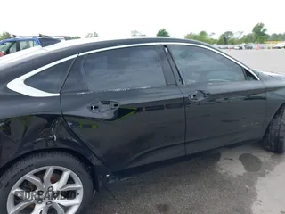 2016 Chevrolet Impala LT z VIN 2G1115S38G9142594, wystawiony jako IAAI lot #42346375 z przebiegiem 256 589 mil mil oraz . Historia ofert i sprzedaży dostępna na DreamBid. Obrazek 18.