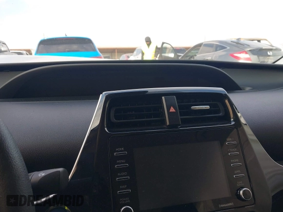 2022 Toyota Prius L Eco with VIN JTDKAMFU7N3175987, listed as a IAAI auction lot 41625093 with Not provided miles and . Bid and sale history available at DreamBid. Image 7.