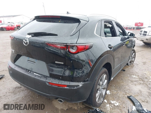 2023 Mazda CX-30 2.5 S Premium Package with VIN 3MVDMBDM3PM559627, listed as a IAAI auction lot 40910485 with 8,365 mi miles. Bid and sale history available at carsss.com. Image 4.