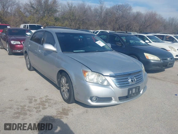 2008 Toyota Avalon XL with VIN 4T1BK36B38U281031, listed as a IAAI auction lot 41268774 with 303,156 mi miles. Bid and sale history available at carsss.com. Image 1.