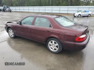 2001 Mazda 626 LX with VIN 1YVGF22D615249099, listed as a Copart auction lot 80753104 with 72,308 mi miles and Salvage Title. Bid and sale history available at carsss.com. Image 2.