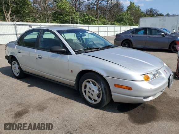 2002 Saturn SL with VIN 1G8ZK52752Z190850, listed as a Copart auction lot 61399245 with 200,085 mi miles and Salvage title. Bid and sale history available at DreamBid. Image 4.