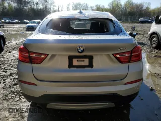2017 BMW X4 xDrive28i with VIN 5UXXW3C52H0T77719, listed as a Copart auction lot 52393155 with 184,664 mi miles and Salvage title. Bid and sale history available at DreamBid. Image 6.