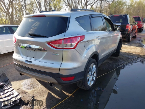 2013 Ford Escape SEL with VIN 1FMCU0HX4DUB98238, listed as a IAAI auction lot 41973221 with 131,590 mi miles and . Bid and sale history available at DreamBid. Image 4.