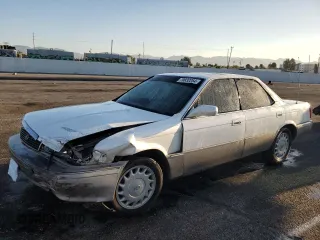 1990 Lexus ES z VIN JT8VV22T5L0096463, wystawiony jako Copart lot #70032254 z przebiegiem 127 414 mil mil oraz Szkoda całkowita • Salvage title. Historia ofert i sprzedaży dostępna na DreamBid. Obrazek 1.