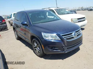2011 Volkswagen Tiguan SEL w/Premium Navi z VIN WVGAV7AX1BW534176, wystawiony jako IAAI lot #42305562 z przebiegiem 132 015 mil mil oraz . Historia ofert i sprzedaży dostępna na DreamBid. Obrazek 1.