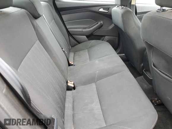 2018 Ford Focus SE z VIN 1FADP3FEXJL288116, wystawiony jako Copart lot #59629655 z przebiegiem 105 461 mil mil oraz Czysty tytuł • Clean title. Historia ofert i sprzedaży dostępna na DreamBid. Obrazek 10.