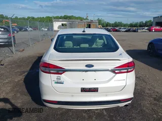 2017 Ford Fusion Titanium with VIN 3FA6P0SU6HR409854, listed as a IAAI auction lot 42143031 with 52,688 mi miles and . Bid and sale history available at DreamBid. Image 16.