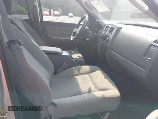 2006 Dodge Dakota SLT z VIN 1D7HE48K96S533601, wystawiony jako IAAI lot #42409723 z przebiegiem 128 591 mil mil oraz . Historia ofert i sprzedaży dostępna na DreamBid. Obrazek 5.