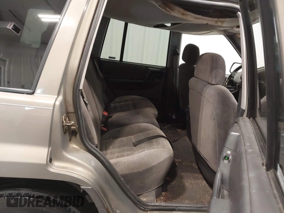 1997 Jeep Grand Cherokee Laredo with VIN 1J4GZ58S2VC746778, listed as a IAAI auction lot 41225925 with 196,679 mi miles. Bid and sale history available at carsss.com. Image 8.