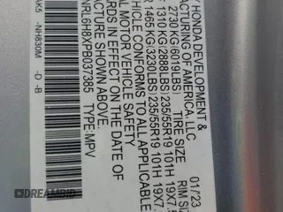 2023 Honda Odyssey Touring z VIN 5FNRL6H8XPB037385, wystawiony jako Copart lot #59461215 z przebiegiem 32 150 mil mil oraz Szkoda całkowita • Salvage title. Historia ofert i sprzedaży dostępna na DreamBid. Obrazek 13.