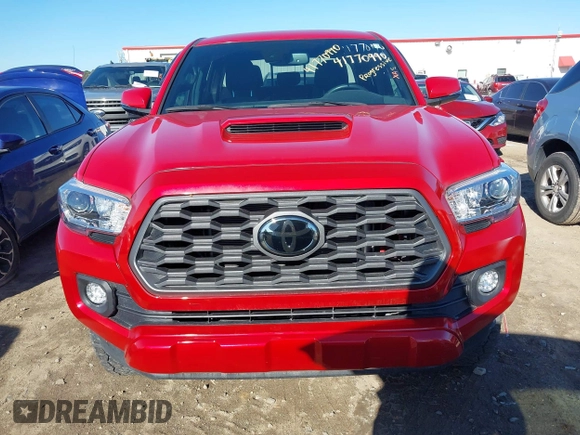 2023 Toyota Tacoma 4WD SR with VIN 3TMCZ5AN1PM613455, listed as a IAAI auction lot 41770990 with 12,643 mi miles. Bid and sale history available at carsss.com. Image 12.