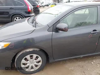 2009 Toyota Corolla with VIN 1NXBU40E99Z138136, listed as a IAAI auction lot 41967052 with 207,892 mi miles. Bid and sale history available at carsss.com. Image 15.
