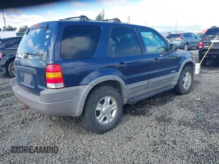 2002 Ford Escape XLT Choice with VIN 1FMYU04172KA40251, listed as a IAAI auction lot 41895889 with 214,935 mi miles and . Bid and sale history available at carsss.com. Image 4.