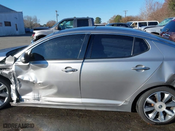 2012 Kia Optima SX with VIN 5XXGR4A6XCG030348, listed as a IAAI auction lot 41002991 with 170,010 mi miles. Bid and sale history available at carsss.com. Image 14.