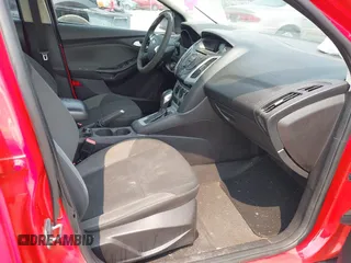 2013 Ford Focus SE z VIN 1FADP3F25DL314809, wystawiony jako IAAI lot #42399393 z przebiegiem 159 394 mil mil oraz . Historia ofert i sprzedaży dostępna na DreamBid. Obrazek 5.