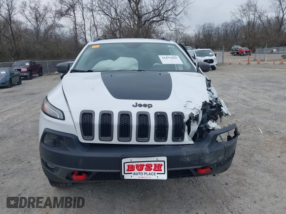 2015 Jeep Cherokee Trailhawk with VIN 1C4PJMBB7FW741365, listed as a IAAI auction lot 41879685 with 94,135 mi miles and . Bid and sale history available at carsss.com. Image 13.